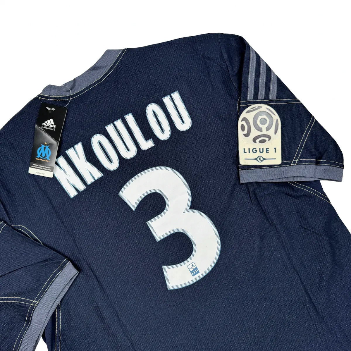 2013/14 OM Extérieur - Nkoulou 3 (L) - Iconic Football Shop