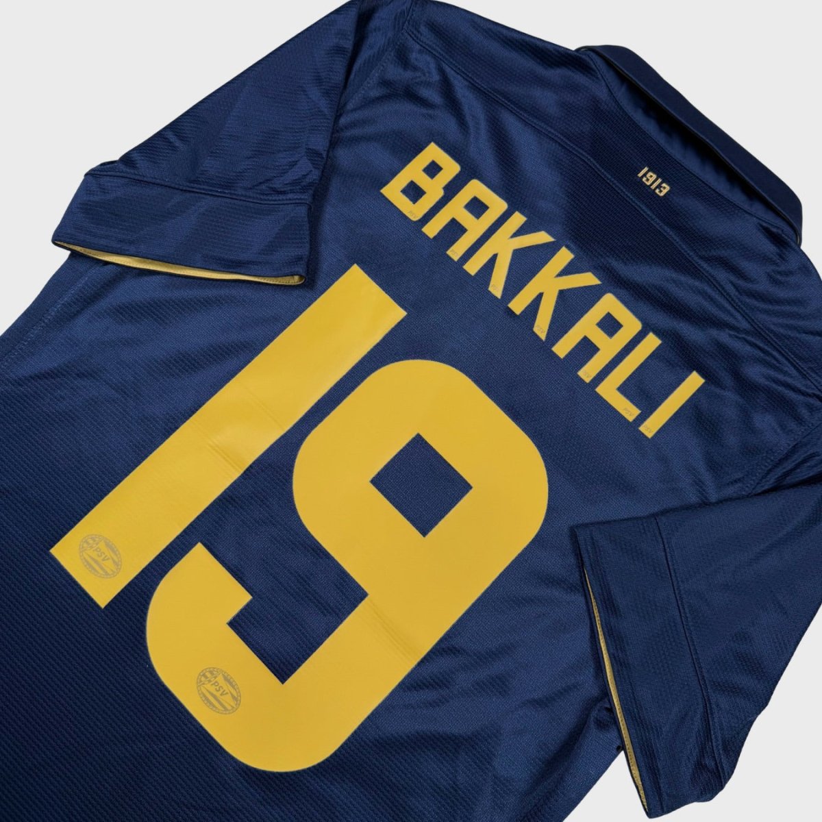 2013/14 PSV Extérieur - Bakkali 19 *CENTENAIRE / STOCK PRO* (M) - Iconic Football Shop