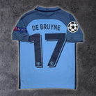 2016/17 Manchester City Domicile - De Bruyne 17 *CHAMPIONS LEAGUE* (10/12a) - Iconic Football Shop