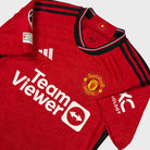2023/24 Manchester United Domicile - Højlund 11 *CHAMPIONS LEAGUE* (XS) - Iconic Football Shop