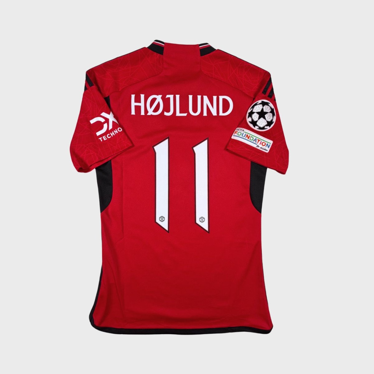 2023/24 Manchester United Domicile - Højlund 11 *CHAMPIONS LEAGUE* (XS) - Iconic Football Shop