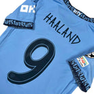 2024/25 Manchester City Domicile - Haaland 9 *CHAMPIONS LEAGUE* (XS) - Iconic Football Shop