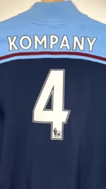 2012_13-Manchester_City-Veste-Kompany_4-(L)1